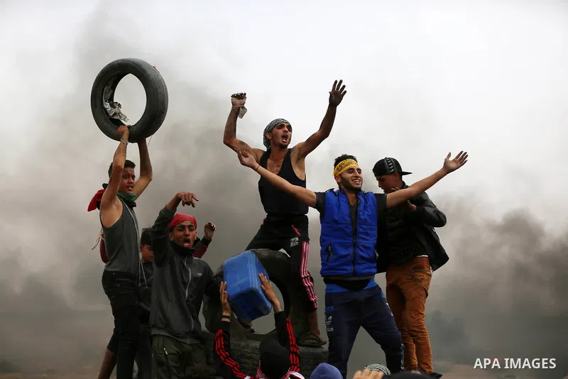 Palestinian protesters clash with Israeli security forces at tents protest at the Israel-Gaza border where Palestinians demand the right to return to their homeland, in east of Gaza city on April 20, 2018. Photo by Yasse...