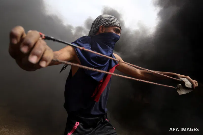 Palestinian protesters clash with Israeli security forces at tents protest at the Israel-Gaza border where Palestinians demand the right to return to their homeland, in east of Gaza city on April 20, 2018. Photo by Yasse...