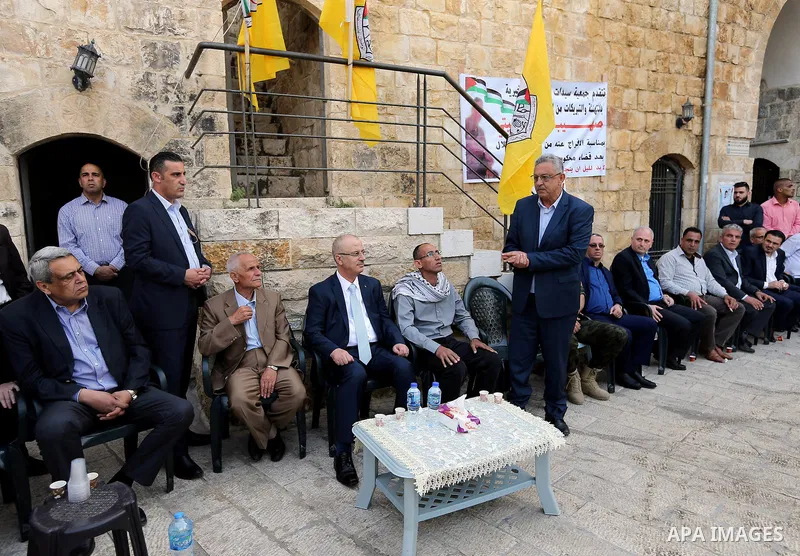 Palestinian Prime Minister Rami Hamdallah visits the Palestinian freed prisoner Suhaib Jbaiti, in the West Bank city of Tulkarem, on April 20, 2018. Photo by Prime Minister Office