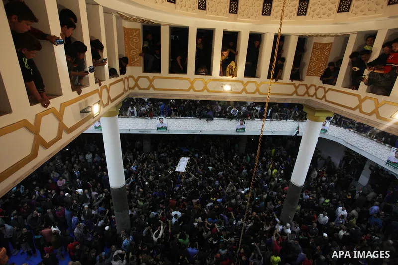 Palestinian mourners carry the body of Palestinian scientist Fadi al-Batsh, assassinated in Malaysia, during his funeral in the northern Gaza Strip, on April 26, 2018. after his body was returned to his homeland, a membe...