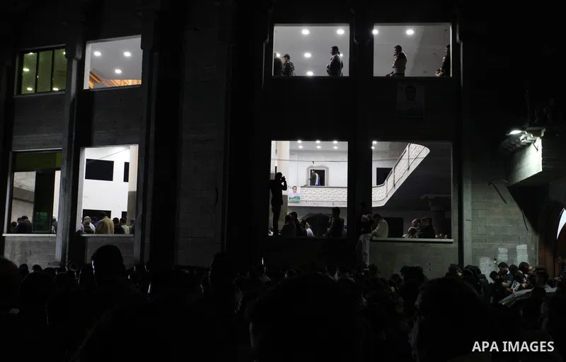 Palestinian mourners carry the body of Palestinian scientist Fadi al-Batsh, assassinated in Malaysia, during his funeral in the northern Gaza Strip, on April 26, 2018. after his body was returned to his homeland, a membe...