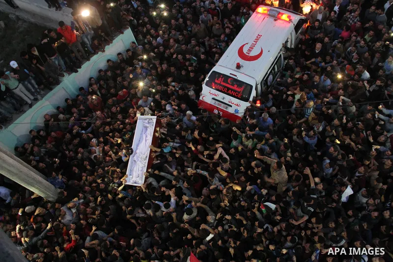 Palestinian mourners carry the body of Palestinian scientist Fadi al-Batsh, assassinated in Malaysia, during his funeral in the northern Gaza Strip, on April 26, 2018. after his body was returned to his homeland, a membe...