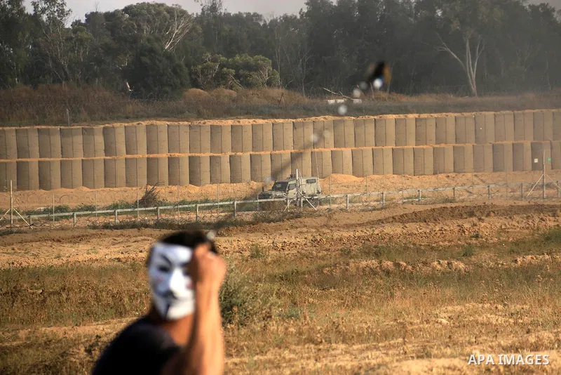 Palestinian protesters clash with Israeli security forces during tents protest demanding the right to return to their homeland, at the Israel-Gaza border, in Bureij in the cetner of Gaza strip on April 27, 2018. Photo by...