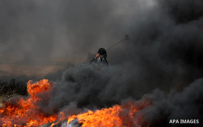 Palestinian protesters clash with Israeli security forces during tents protest demanding the right to return to their homeland, at the Israel-Gaza border, in Khan Younis in the southern Gaza Strip on April 27, 2018. on A...