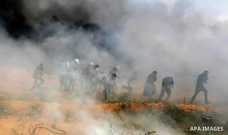 Palestinian protesters clash with Israeli security forces during tents protest demanding the right to return to their homeland, at the Israel-Gaza border, in Khan Younis in the southern Gaza Strip on April 27, 2018. on A...