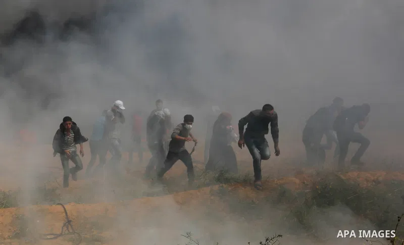 Palestinian protesters clash with Israeli security forces during tents protest demanding the right to return to their homeland, at the Israel-Gaza border, in Khan Younis in the southern Gaza Strip on April 27, 2018. on A...