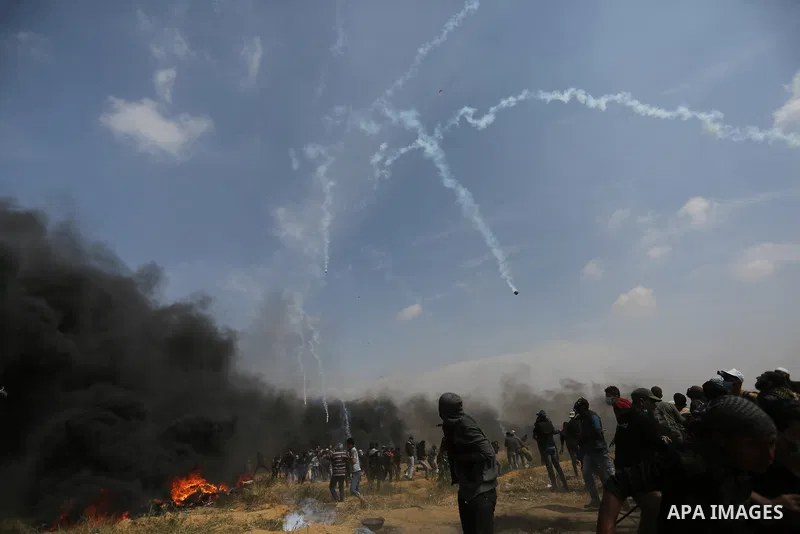 Palestinian protesters clash with Israeli security forces during tents protest demanding the right to return to their homeland, at the Israel-Gaza border, in Khan Younis in the southern Gaza Strip on April 27, 2018. on A...
