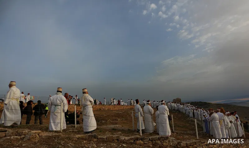 Members of the ancient Samaritan community take part in a traditional pilgrimage marking the holiday of Passover, on Mount Gerizim near the West Bank city of Nablus, on May 6, 2018. Photo by Shadi Jarar'ah