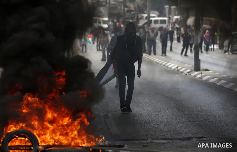 Palestinian protesters clash with Israeli security forces following a protest against U.S. embassy move to Jerusalem and on the occasion of the 70th anniversary of the "Nakba" in Bethlehem in the occupied West Bank May 1...