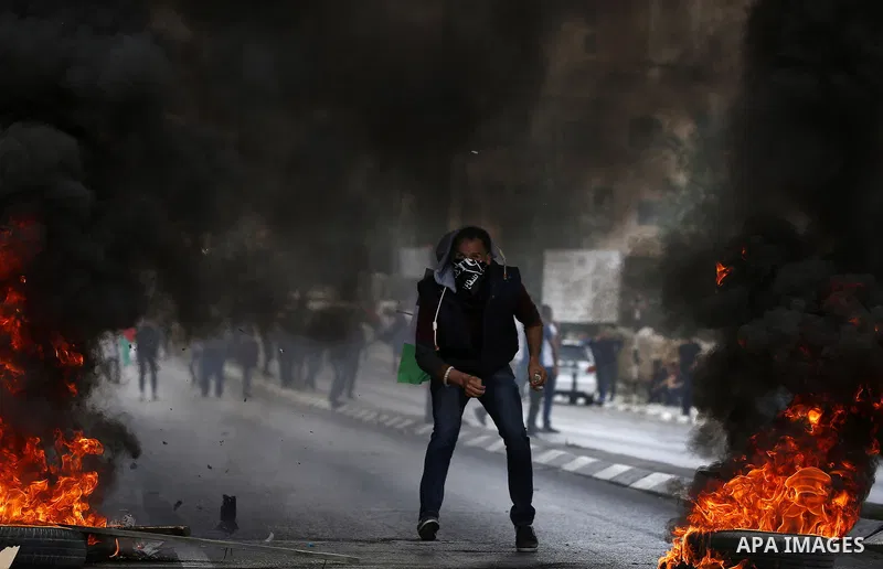 Palestinian protesters clash with Israeli security forces following a protest against U.S. embassy move to Jerusalem and on the occasion of the 70th anniversary of the "Nakba" in Bethlehem in the occupied West Bank May 1...