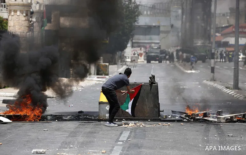 Palestinian protesters clash with Israeli security forces following a protest against U.S. embassy move to Jerusalem and on the occasion of the 70th anniversary of the "Nakba" in Bethlehem in the occupied West Bank May 1...