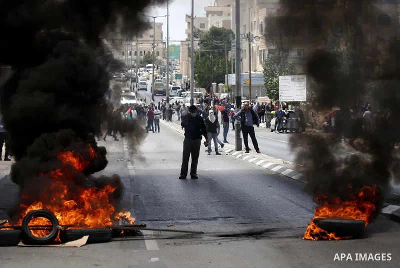 Palestinian protesters clash with Israeli security forces following a protest against U.S. embassy move to Jerusalem and on the occasion of the 70th anniversary of the "Nakba" in Bethlehem in the occupied West Bank May 1...
