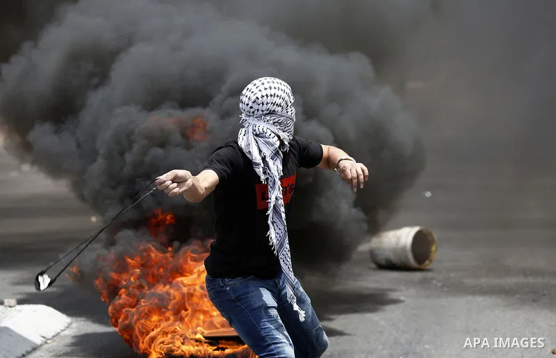 Palestinian protesters clash with Israeli security forces following a protest against U.S. embassy move to Jerusalem and on the occasion of the 70th anniversary of the "Nakba" in Bethlehem in the occupied West Bank May 1...