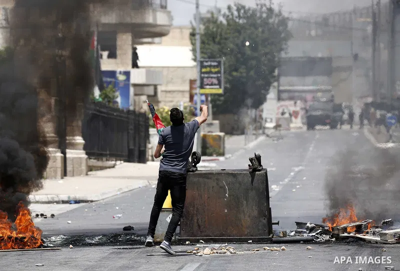 Palestinian protesters clash with Israeli security forces following a protest against U.S. embassy move to Jerusalem and on the occasion of the 70th anniversary of the "Nakba" in Bethlehem in the occupied West Bank May 1...