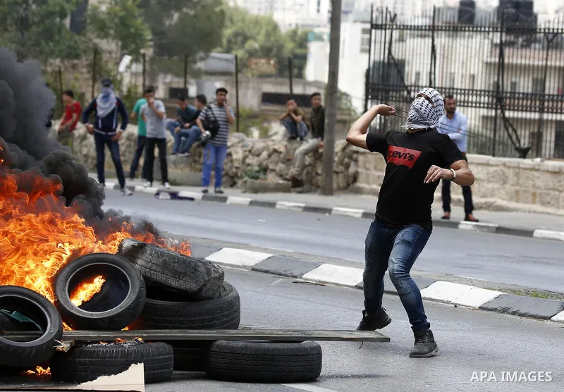 Palestinian protesters clash with Israeli security forces following a protest against U.S. embassy move to Jerusalem and on the occasion of the 70th anniversary of the "Nakba" in Bethlehem in the occupied West Bank May 1...