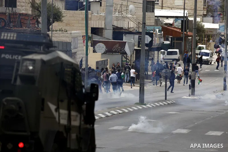 Palestinian protesters clash with Israeli security forces following a protest against U.S. embassy move to Jerusalem and on the occasion of the 70th anniversary of the "Nakba" in Bethlehem in the occupied West Bank May 1...