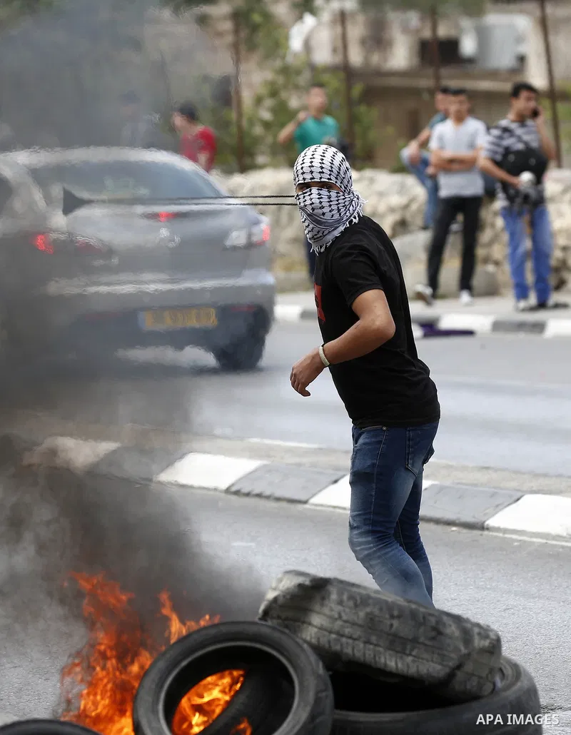 Palestinian protesters clash with Israeli security forces following a protest against U.S. embassy move to Jerusalem and on the occasion of the 70th anniversary of the "Nakba" in Bethlehem in the occupied West Bank May 1...