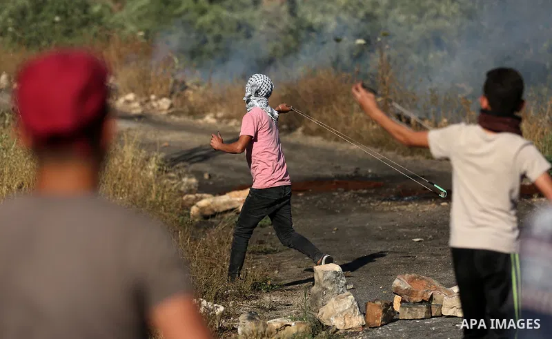 Palestinian protesters clash with Israeli secuirty forces against U.S. embassy move to Jerusalem and on the occasion of the 70th anniversary of the "Nakba", in the West Bank village of Kafr Qaddum, east of Qalqilia on Ma...