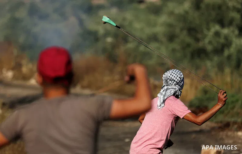 Palestinian protesters clash with Israeli secuirty forces against U.S. embassy move to Jerusalem and on the occasion of the 70th anniversary of the "Nakba", in the West Bank village of Kafr Qaddum, east of Qalqilia on Ma...