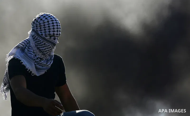 Palestinian protesters clash with Israeli secuirty forces against U.S. embassy move to Jerusalem and on the occasion of the 70th anniversary of the "Nakba", in the West Bank village of Kafr Qaddum, east of Qalqilia on Ma...