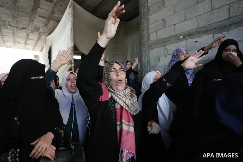 Relatives of Palestinian Nasser Ghorab, 51, who was killed the day before during clashes with Israeli troops along the border with Israel in a tent city protest where Palestinians demand the right to return to their home...