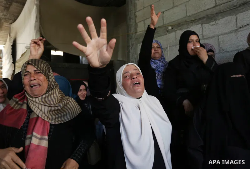 Relatives of Palestinian Nasser Ghorab, 51, who was killed the day before during clashes with Israeli troops along the border with Israel in a tent city protest where Palestinians demand the right to return to their home...