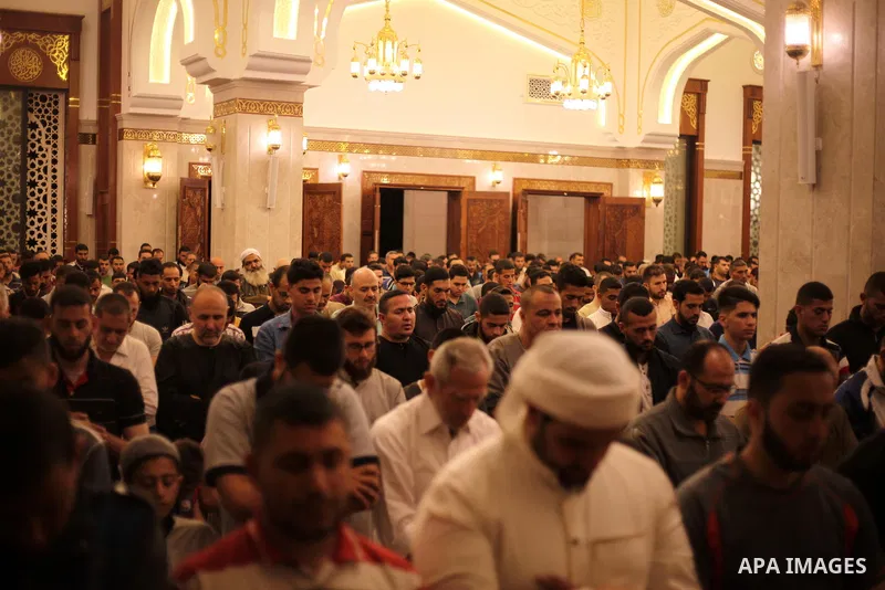 Palestinian worshipers attend a night prayer known as ''Tarawih'' on the first day of the Muslim holy month of Ramadan, at al-Hasaynah mosque in Gaza city on May 17, 2018. Ramadan is the holiest month in Islam, and obser...