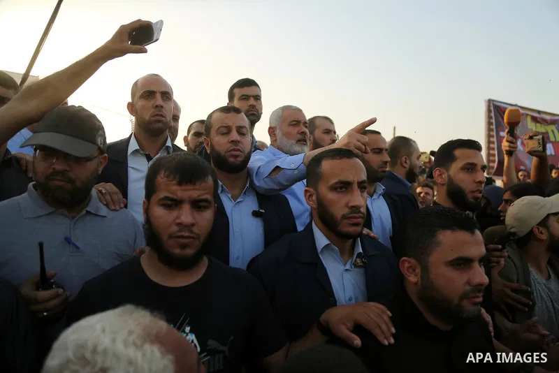Palestinian Hamas Chief Ismail Haniyeh gestures during tents protest where Palestinians demanding the right to return to their homeland, at the Israel-Gaza border, in east of Gaza city, on May 18, 2018. Photo by Dawoud A...