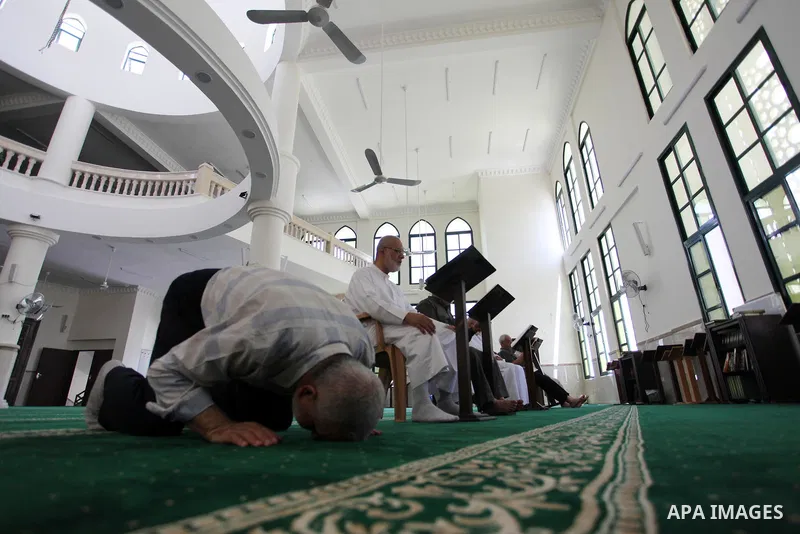Palestinians read the Koran, Islam's holiest book, at a mosque in Gaza City on the Muslim holy month of Ramadan, on May 20, 2018. Ramadan is sacred to Muslims because it is during that month that tradition says the Koran...
