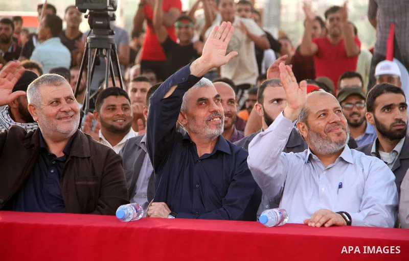 Hamas's leader in the Gaza Strip Yahya Sinwar attends the breakfast meal at the Israel-Gaza border, in east of Gaza city, on May 23, 2018. Ramadan is sacred to Muslims because it is during that month that tradition says...