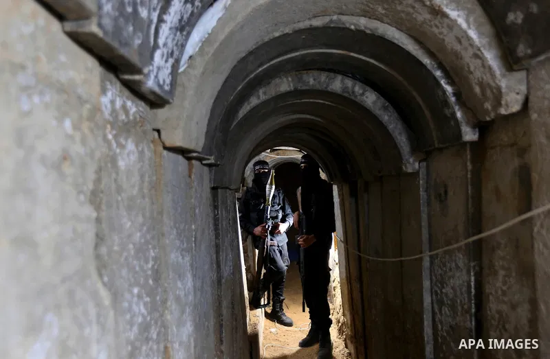 Palestinian militants guard the tunnel in the east of Gaza city on the Muslim holy fasting month of Ramadan on May 24, 2018. Ramadan is sacred to Muslims because it is during that month that tradition says the Koran was...