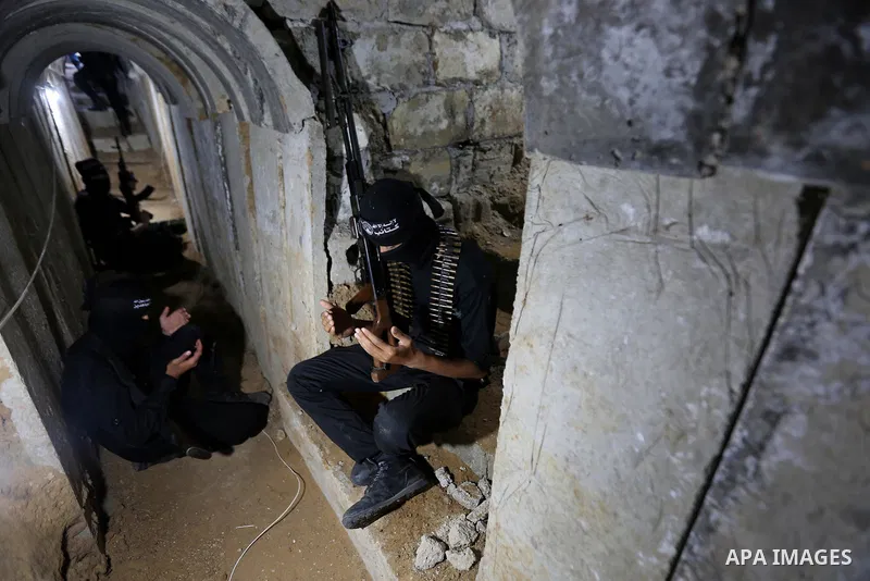 Palestinian militants guard the tunnel in the east of Gaza city on the Muslim holy fasting month of Ramadan on May 24, 2018. Ramadan is sacred to Muslims because it is during that month that tradition says the Koran was...