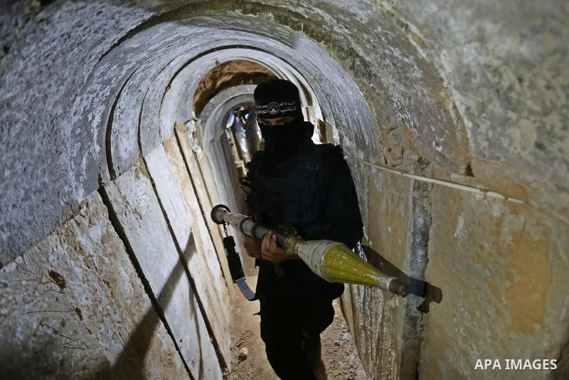 Palestinian militants guard the tunnel in the east of Gaza city on the Muslim holy fasting month of Ramadan on May 24, 2018. Ramadan is sacred to Muslims because it is during that month that tradition says the Koran was...