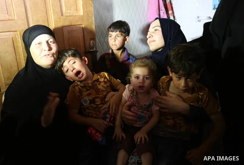 Relatives of Palestinian Ahmed Qutoosh, 23, who died of his wounds endured during clashes with Israeli troops in a tent city protest where Palestinians demand the right to return to their homeland at the Israel-Gaza bord...