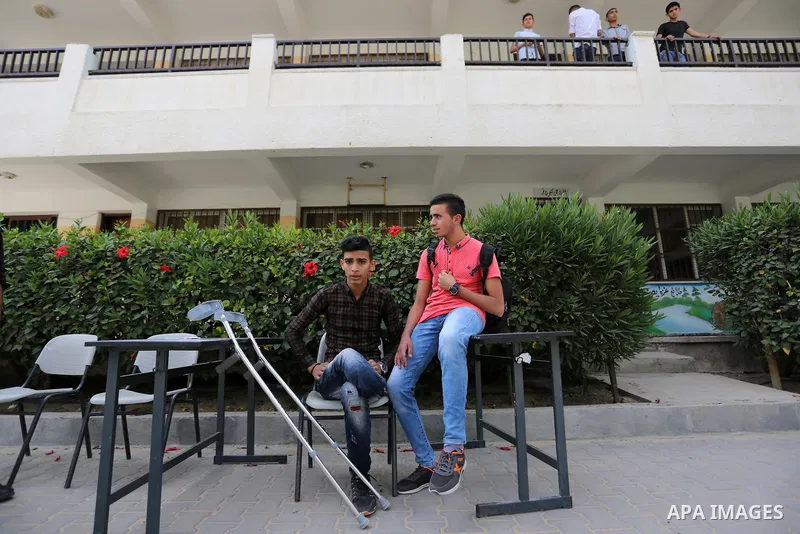 Palestinian Mohammed Musabeh, 17, a High school student, who amputated his leg after he was shot by Israeli troops during clashes in tents protest demanding the right to return to their homeland, at the Israel-Gaza borde...