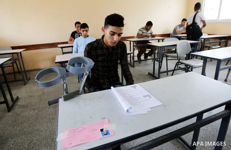Palestinian Mohammed Musabeh, 17, a High school student, who amputated his leg after he was shot by Israeli troops during clashes in tents protest demanding the right to return to their homeland, at the Israel-Gaza borde...