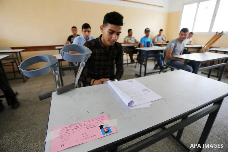 Palestinian Mohammed Musabeh, 17, a High school student, who amputated his leg after he was shot by Israeli troops during clashes in tents protest demanding the right to return to their homeland, at the Israel-Gaza borde...