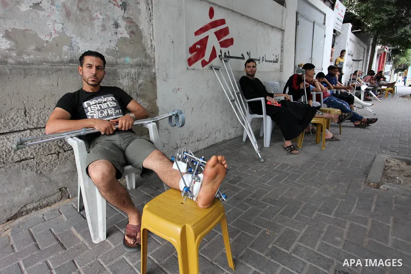 Palestinians who were injured during clashes with Israeli troops in tents protest where Palestinians demand their rights to return to their homeland at Israel-Gaza border, wait to receive treatment at Doctors Without Bor...