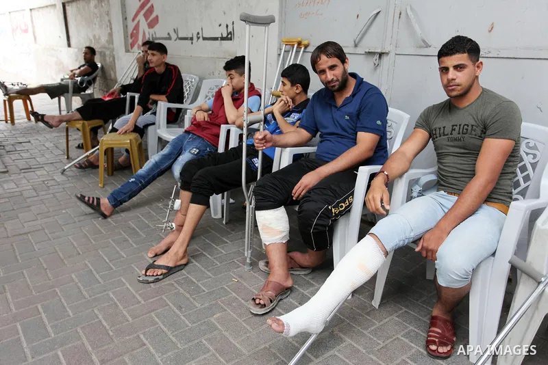 Palestinians who were injured during clashes with Israeli troops in tents protest where Palestinians demand their rights to return to their homeland at Israel-Gaza border, wait to receive treatment at Doctors Without Bor...
