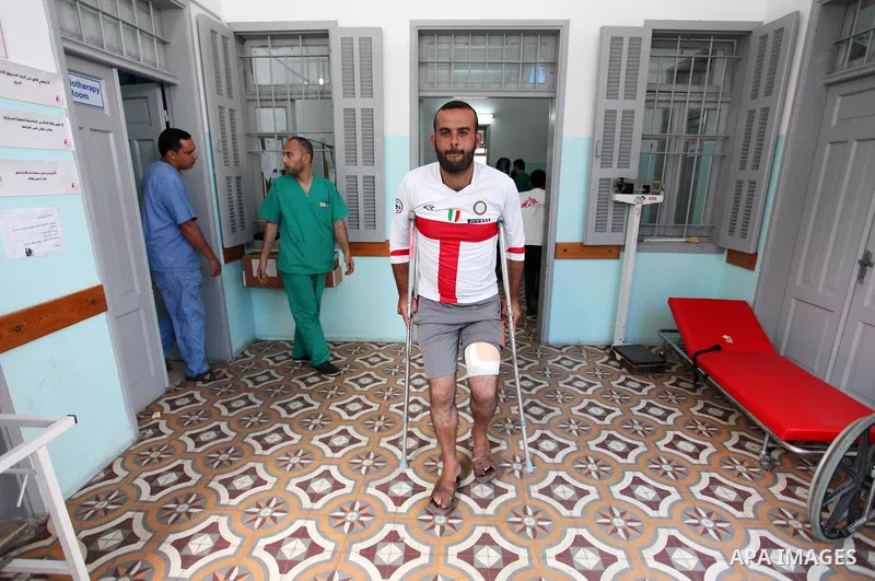 Palestinians who were injured during clashes with Israeli troops in tents protest where Palestinians demand their rights to return to their homeland at Israel-Gaza border, wait to receive treatment at Doctors Without Bor...