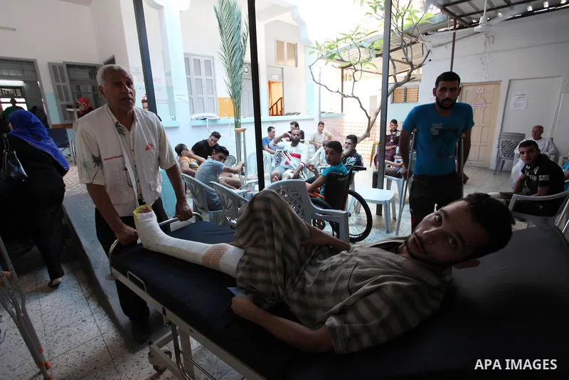 Palestinians who were injured during clashes with Israeli troops in tents protest where Palestinians demand their rights to return to their homeland at Israel-Gaza border, wait to receive treatment at Doctors Without Bor...