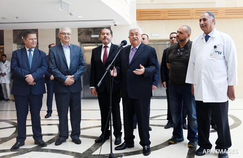 Palestinian President Mahmoud Abbas gives a short statement before leaving a hospital in the West Bank city of Ramallah on May 28, 2018 following eight days of treatment for pneumonia. Photo by Thaer Ganaim