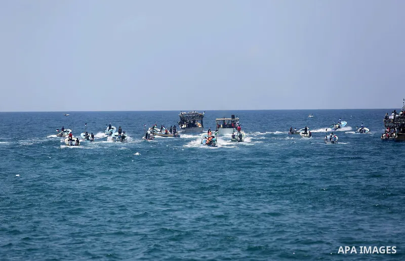 Palestinian activists ride fishing boats as they protesting and perhaps trying to breach Israel's naval blockade on Gaza, setting to sail from Gaza City harbour towards Europe on May 29, 2018. Palestinians in Gaza are pl...