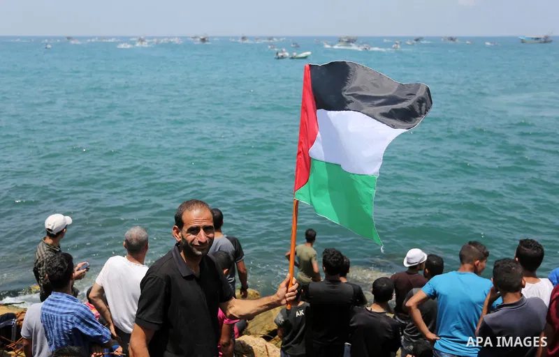 Palestinian activists ride fishing boats as they protesting and perhaps trying to breach Israel's naval blockade on Gaza, setting to sail from Gaza City harbour towards Europe on May 29, 2018. Palestinians in Gaza are pl...