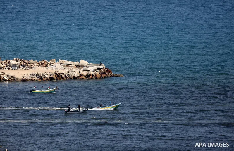 Palestinian activists ride fishing boats as they protesting and perhaps trying to breach Israel's naval blockade on Gaza, setting to sail from Gaza City harbour towards Europe on May 29, 2018. Palestinians in Gaza are pl...