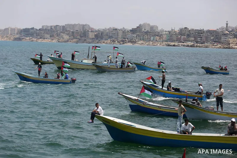 Palestinian activists ride fishing boats as they protesting and perhaps trying to breach Israel's naval blockade on Gaza, setting to sail from Gaza City harbour towards Europe on May 29, 2018. Palestinians in Gaza are pl...