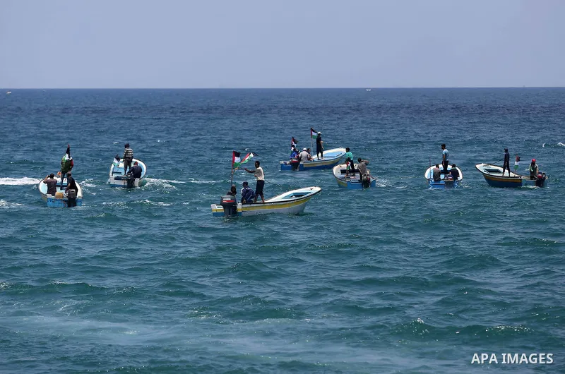Palestinian activists ride fishing boats as they protesting and perhaps trying to breach Israel's naval blockade on Gaza, setting to sail from Gaza City harbour towards Europe on May 29, 2018. Palestinians in Gaza are pl...