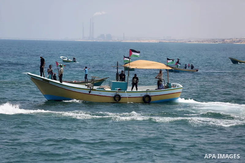 Palestinian activists ride fishing boats as they protesting and perhaps trying to breach Israel's naval blockade on Gaza, setting to sail from Gaza City harbour towards Europe on May 29, 2018. Palestinians in Gaza are pl...