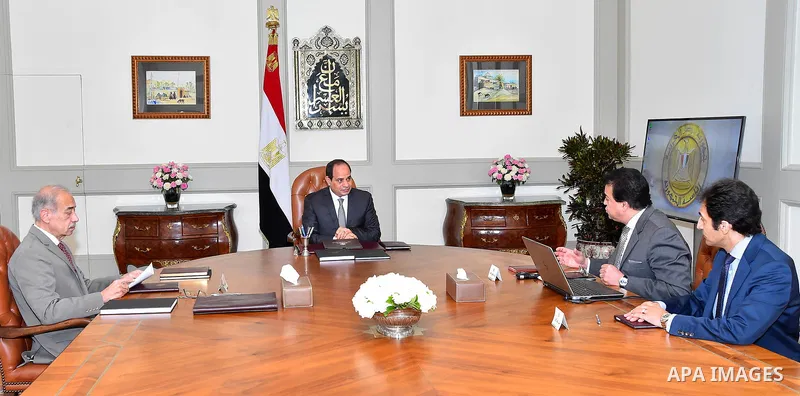 Egyptian President Abdel Fattah al-Sisi meets with Sharif Ismail, Prime Minister in Cairo, Egypt, on May 29, 2018. Photo by Egyptian President Office