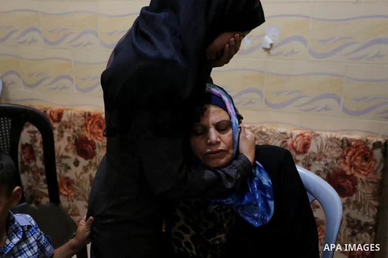 Relatives of Palestinian Naji Ghneim, 23, who died of his wounds endured during clashes with Israeli troops in a tent city protest where Palestinians demand the right to return to their homeland at the Israel-Gaza border...